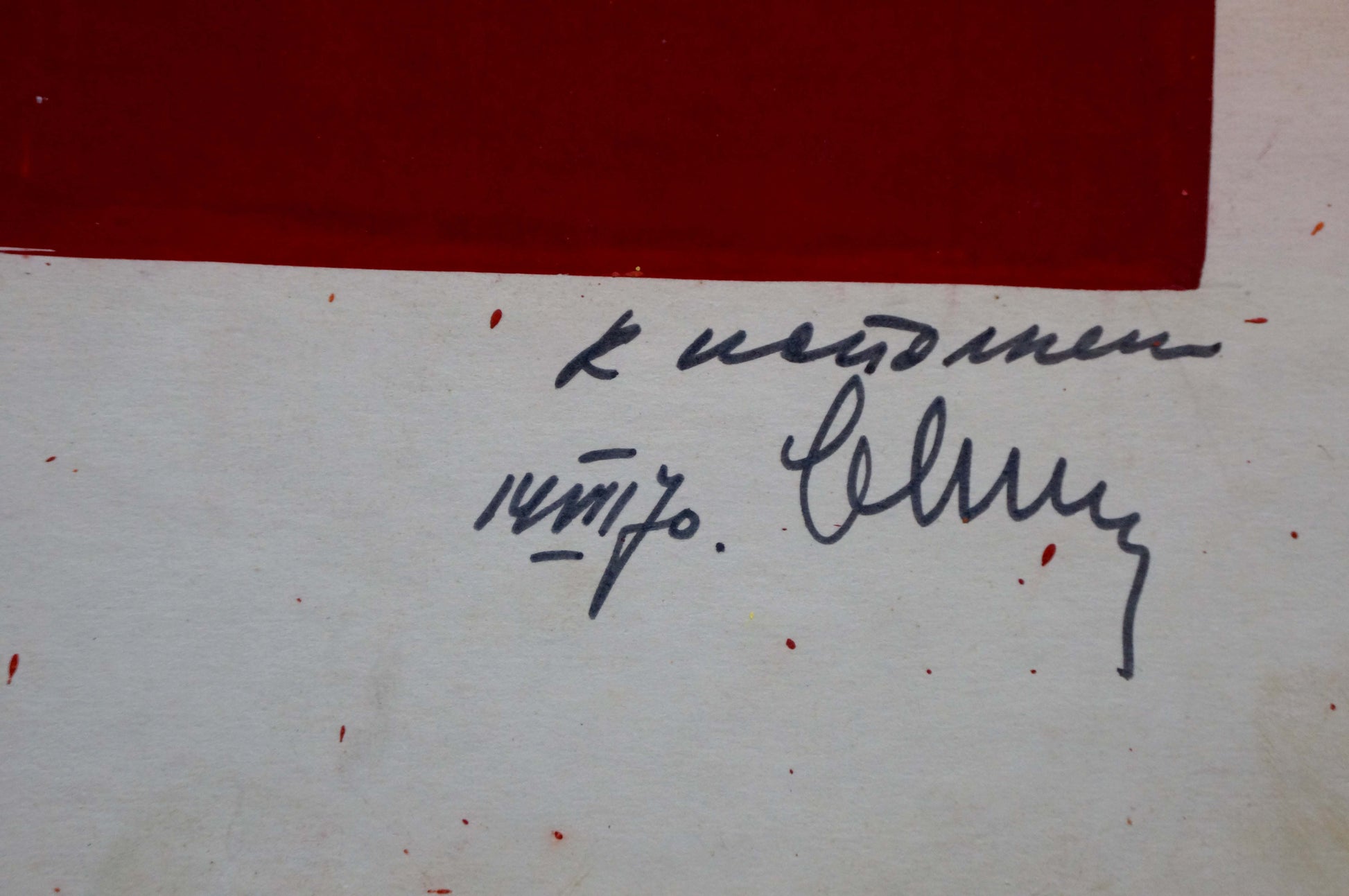 Back of Lenin portrait painting with black ink signature under red rectangle