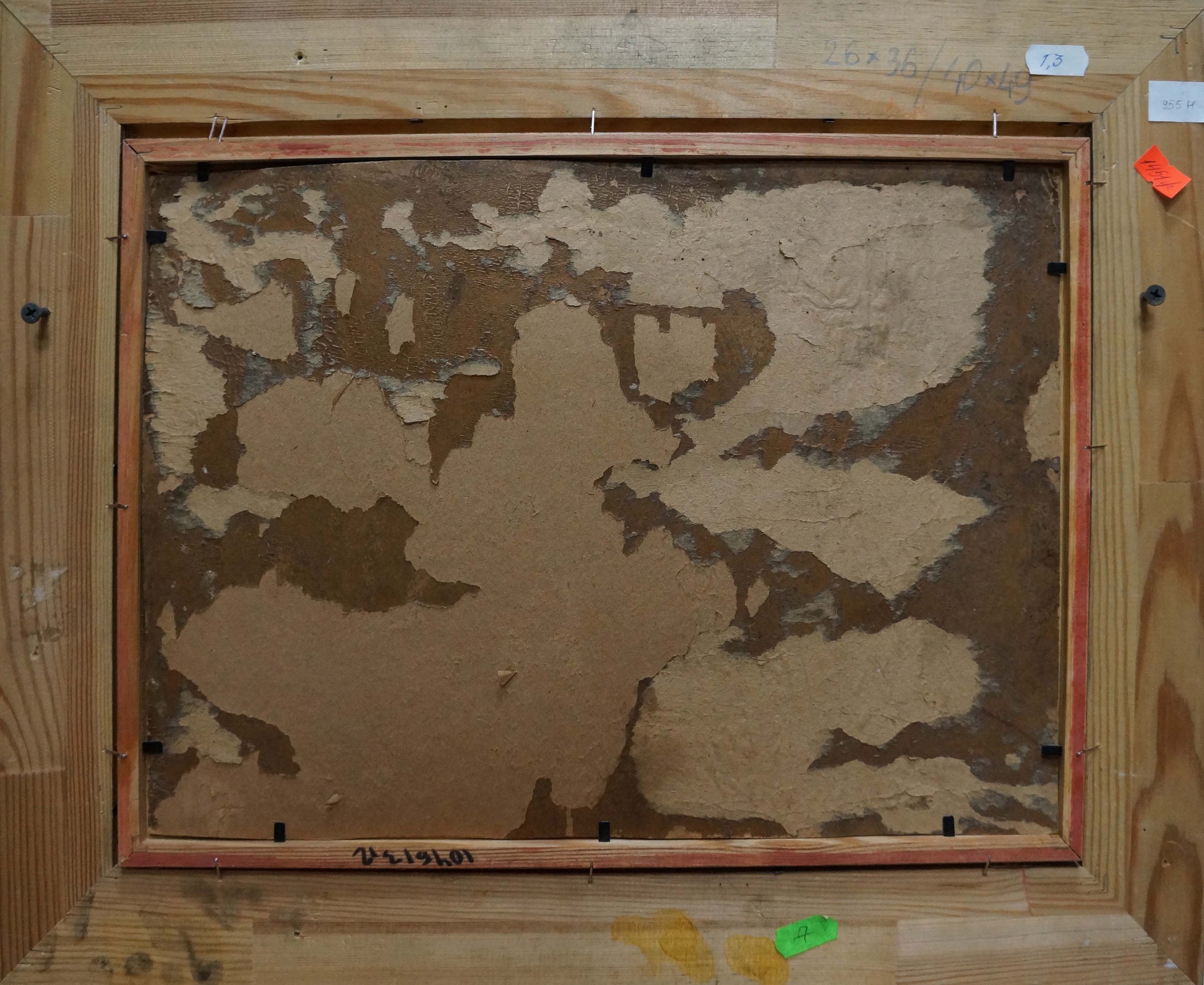 Back of framed oil painting In the Woods with peeling paint on wood panel
