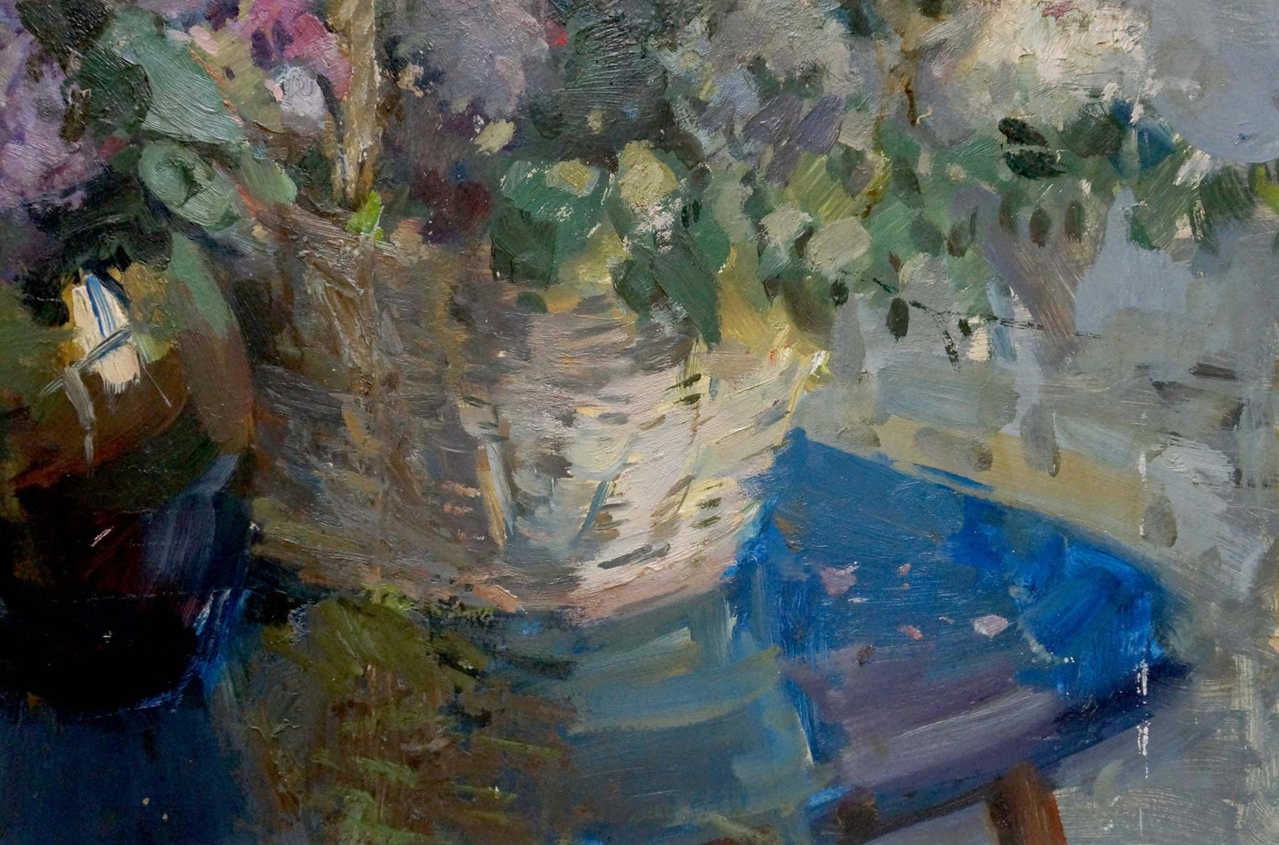 Oil painting by Zvyagintsev Rostislav Mikhailovich: basket with green leaves, purple flowers