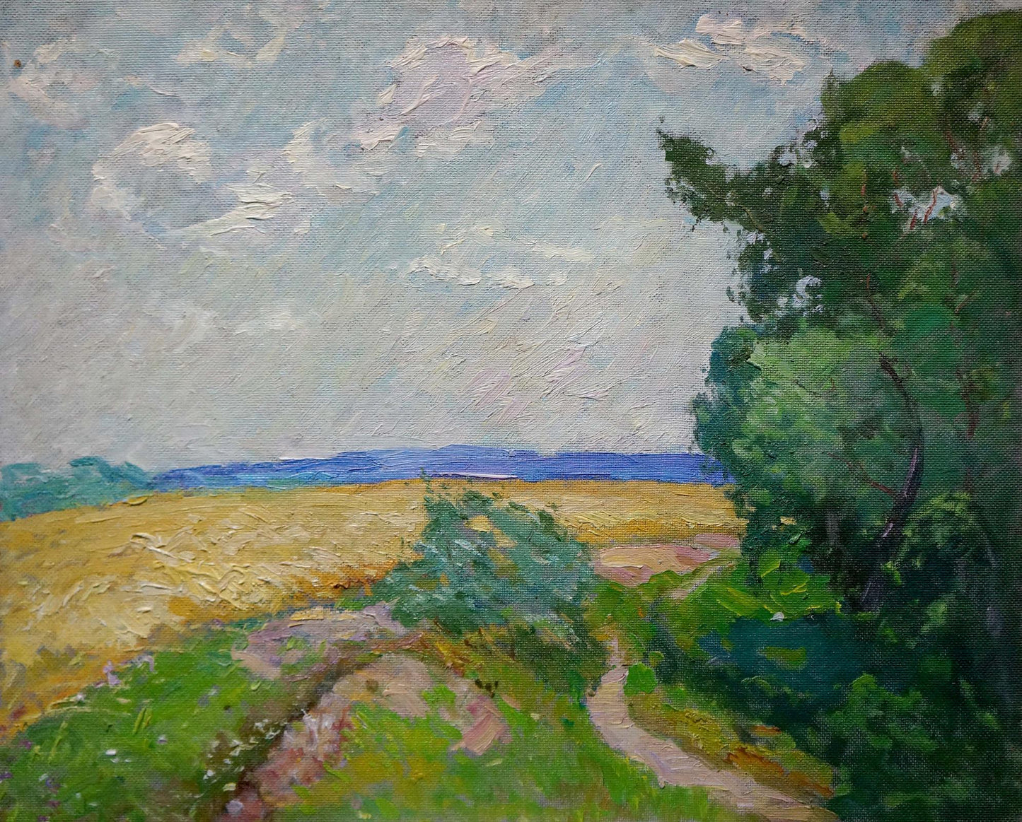 Oil painting by Sevastyanov Viktor Grigorievich: golden field under blue sky