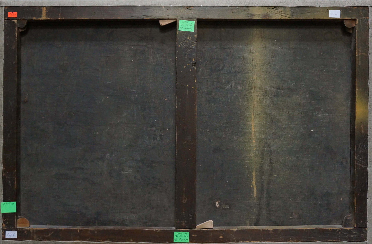 Back of Lorentsev R. oil painting in worn dark wood frame with green corner labels