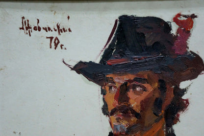 Oil painting portrait of man in dark hat with red accents by Zhurakovsky Victor Petrovich