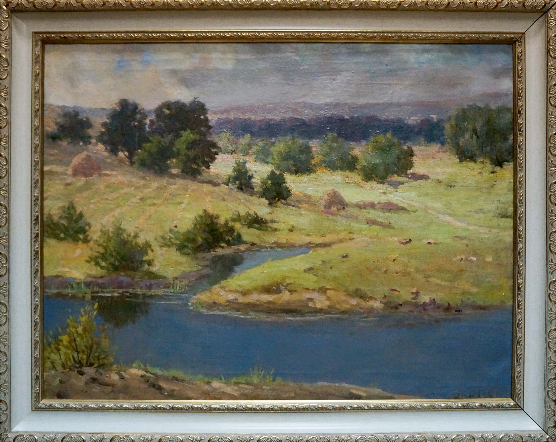 Oil painting by Nevkrytyy Denys Nykyforovych: serene river in green hills