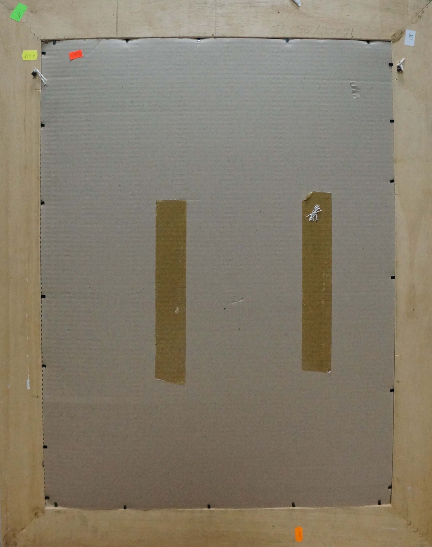 Back of Oil painting Flowers F. Manjos on gray cardboard with brown tape