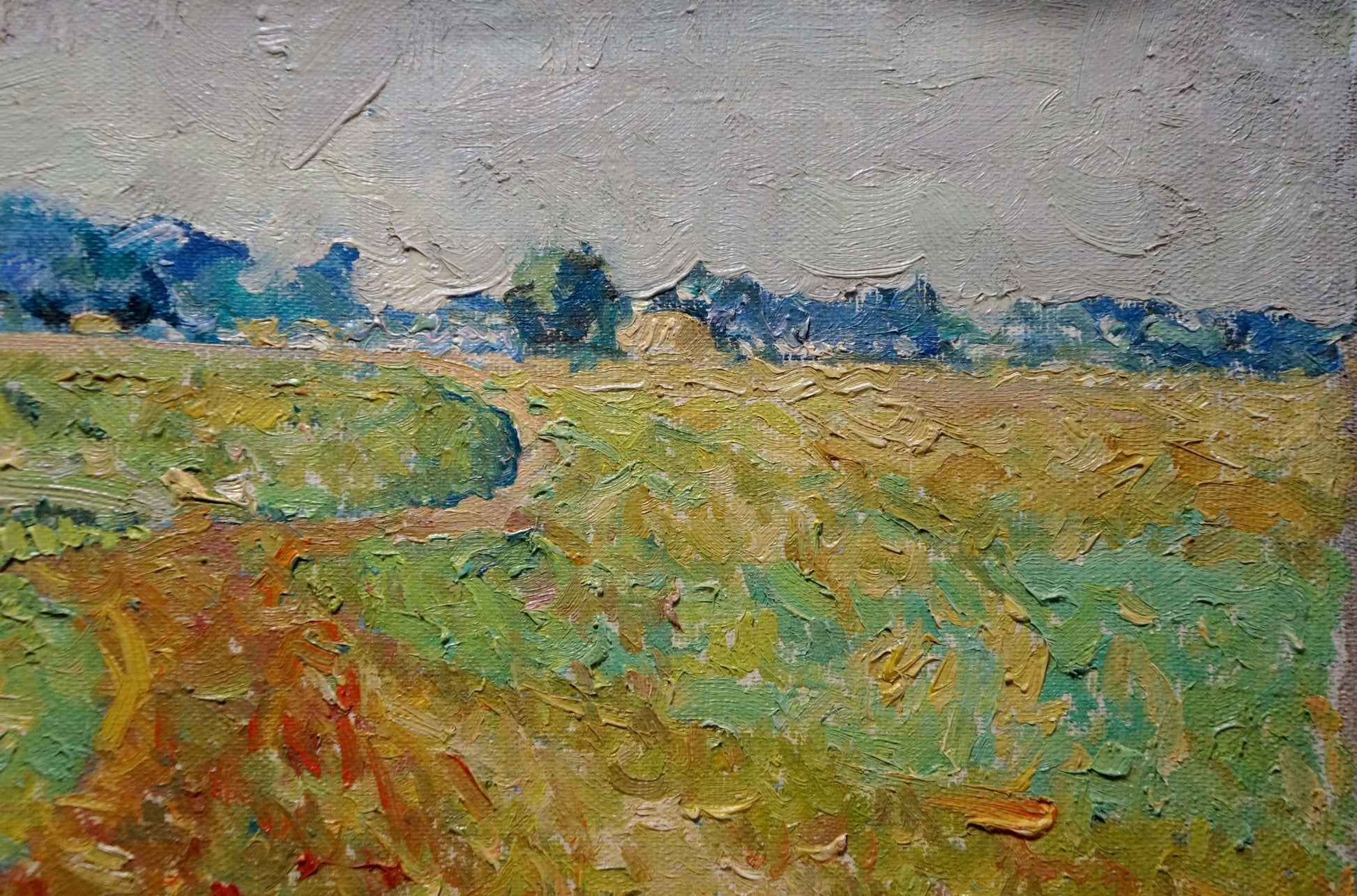 Impasto oil painting by Sevastyanov Viktor Grigorievich: golden field under gray sky