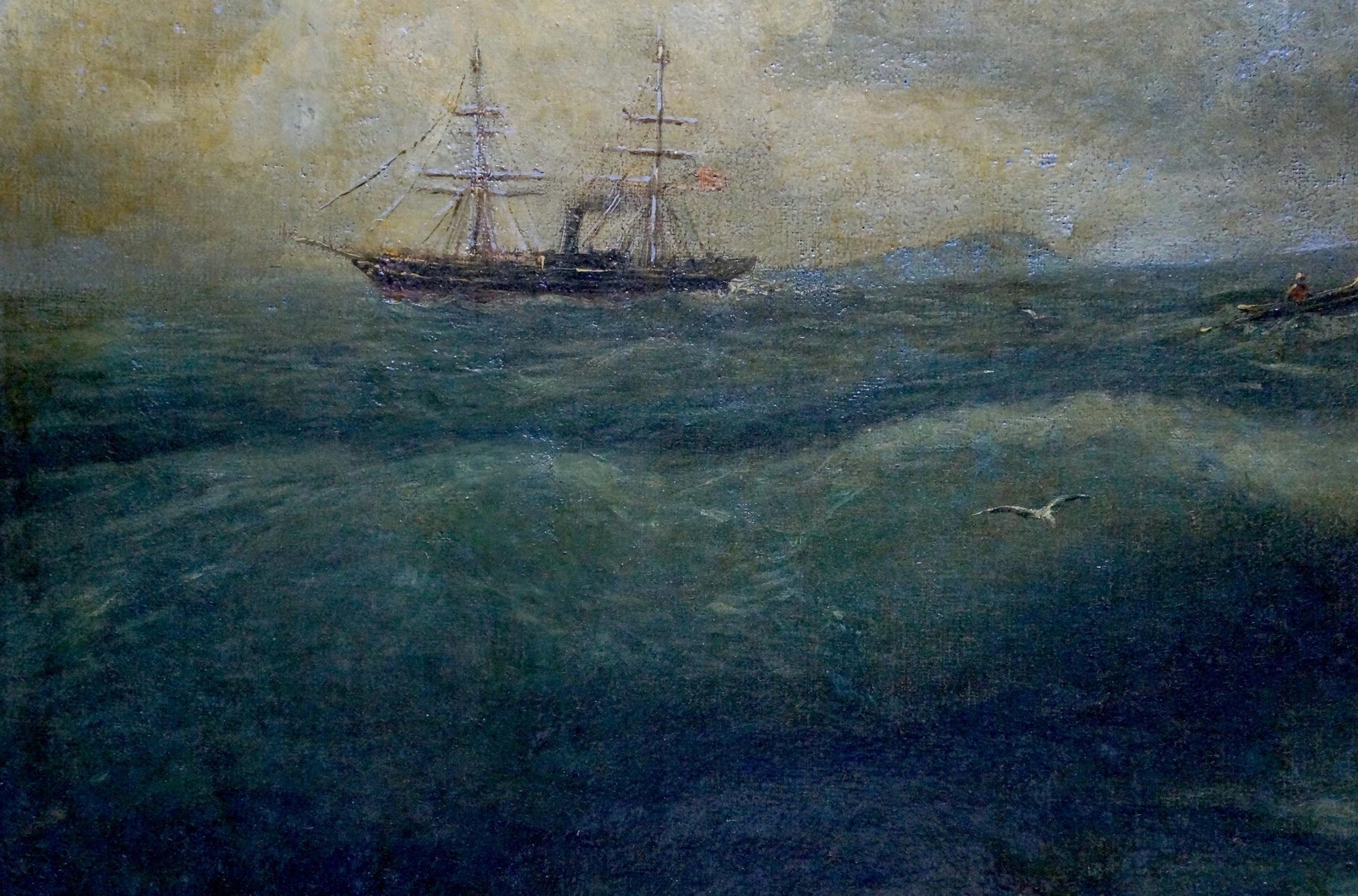 Oil painting of dark-hulled 3-masted ship with smokestack and US flag in raging sea