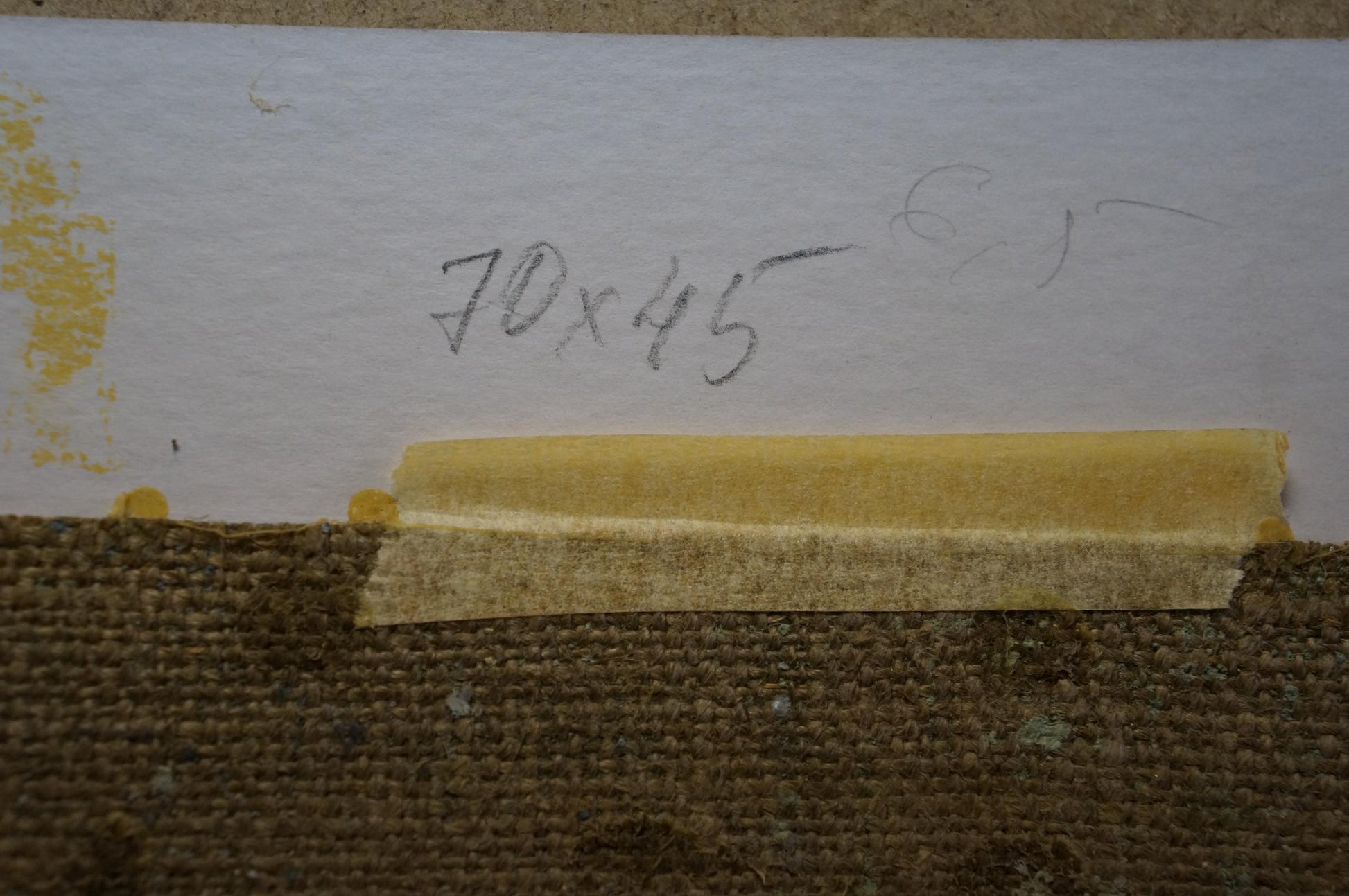 Yellow adhesive strip with handwritten measurements on back of Plamenitsky oil painting