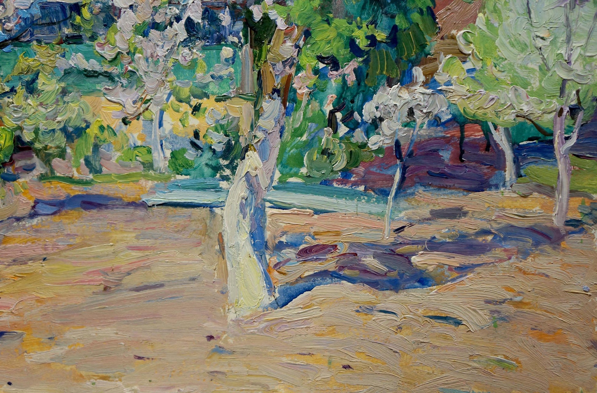 Vibrant impressionist oil painting by Tartakovsky Isaak Iosifovich of sunlit orchard