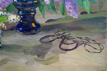 Oil painting of luxurious lilac in dark blue speckled ceramic vase