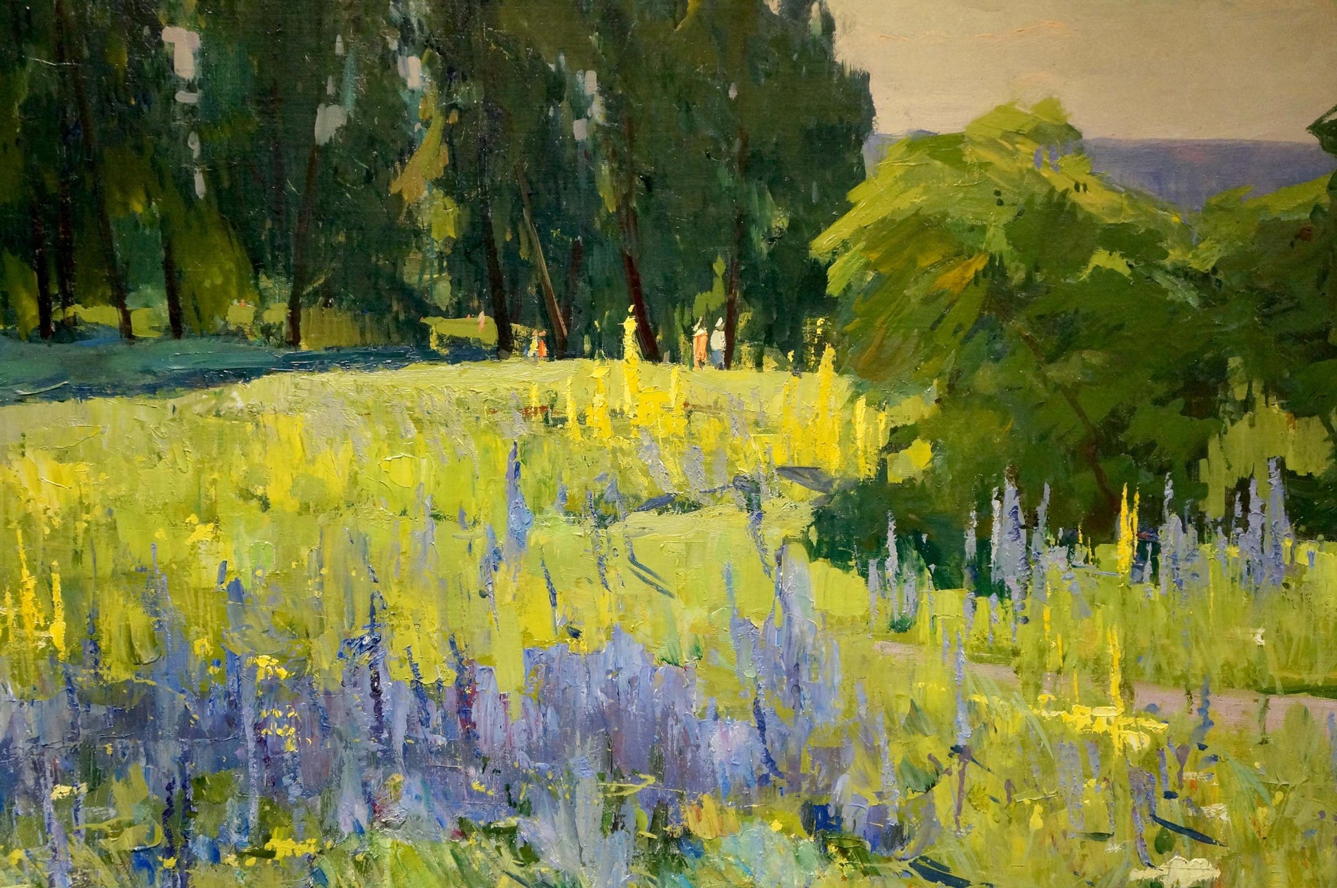 Vibrant oil painting by Khitrova Tamara Alexandrovna of sunlit wildflower meadow