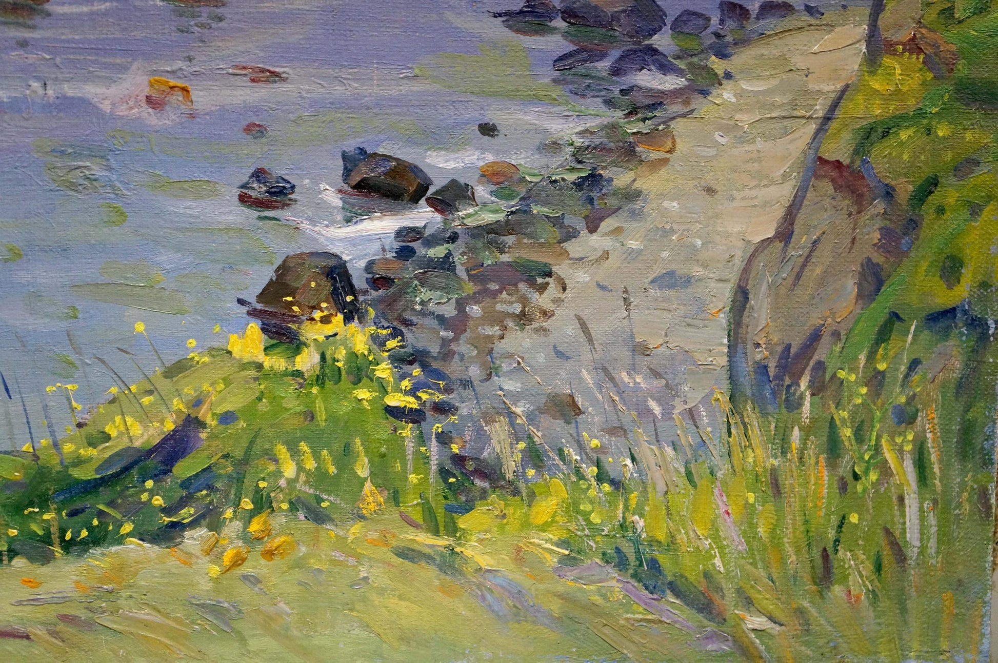 Vibrant impressionist oil painting by Tyukha Ivan Andreevich of rocky shoreline with yellow wildflowers