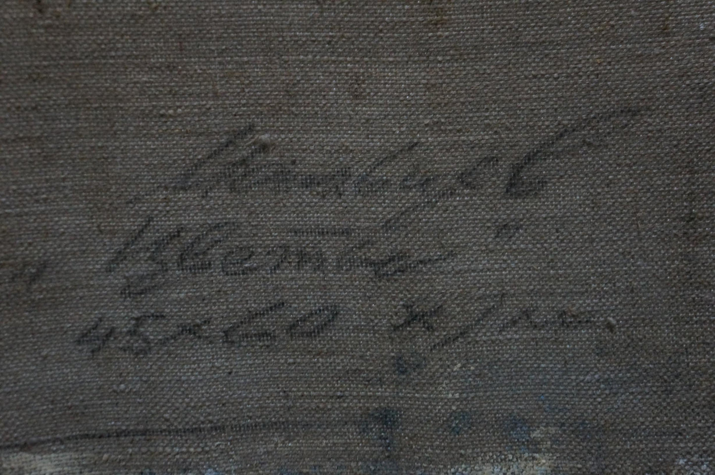 Handwritten signature by Evgeny Vsevolodovich Volobuev on dark gray textured canvas back of oil painting Tea and flowers