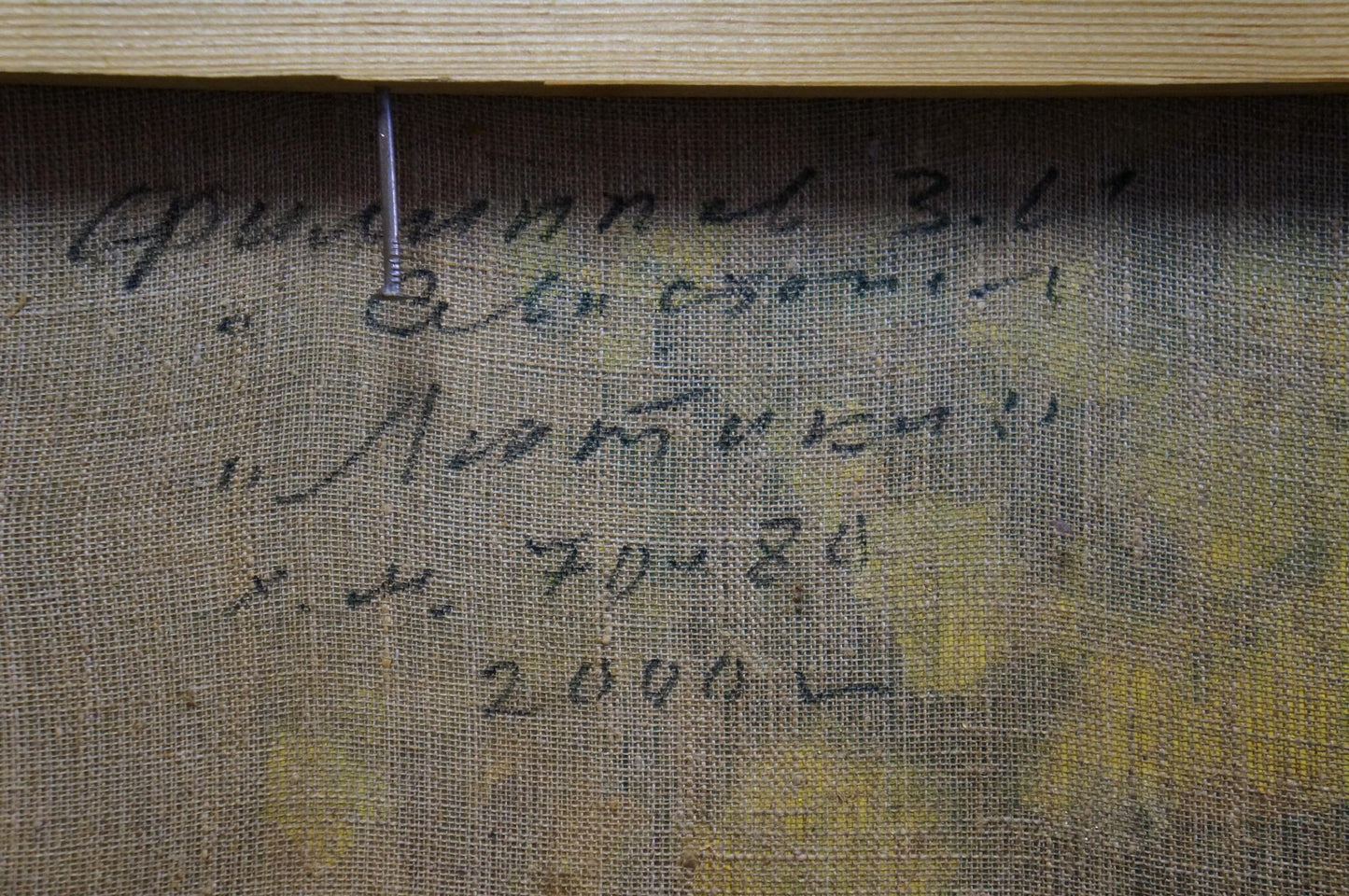 Back of Oil painting Flowers Filippov Z. I. with handwritten black ink inscription on beige canvas