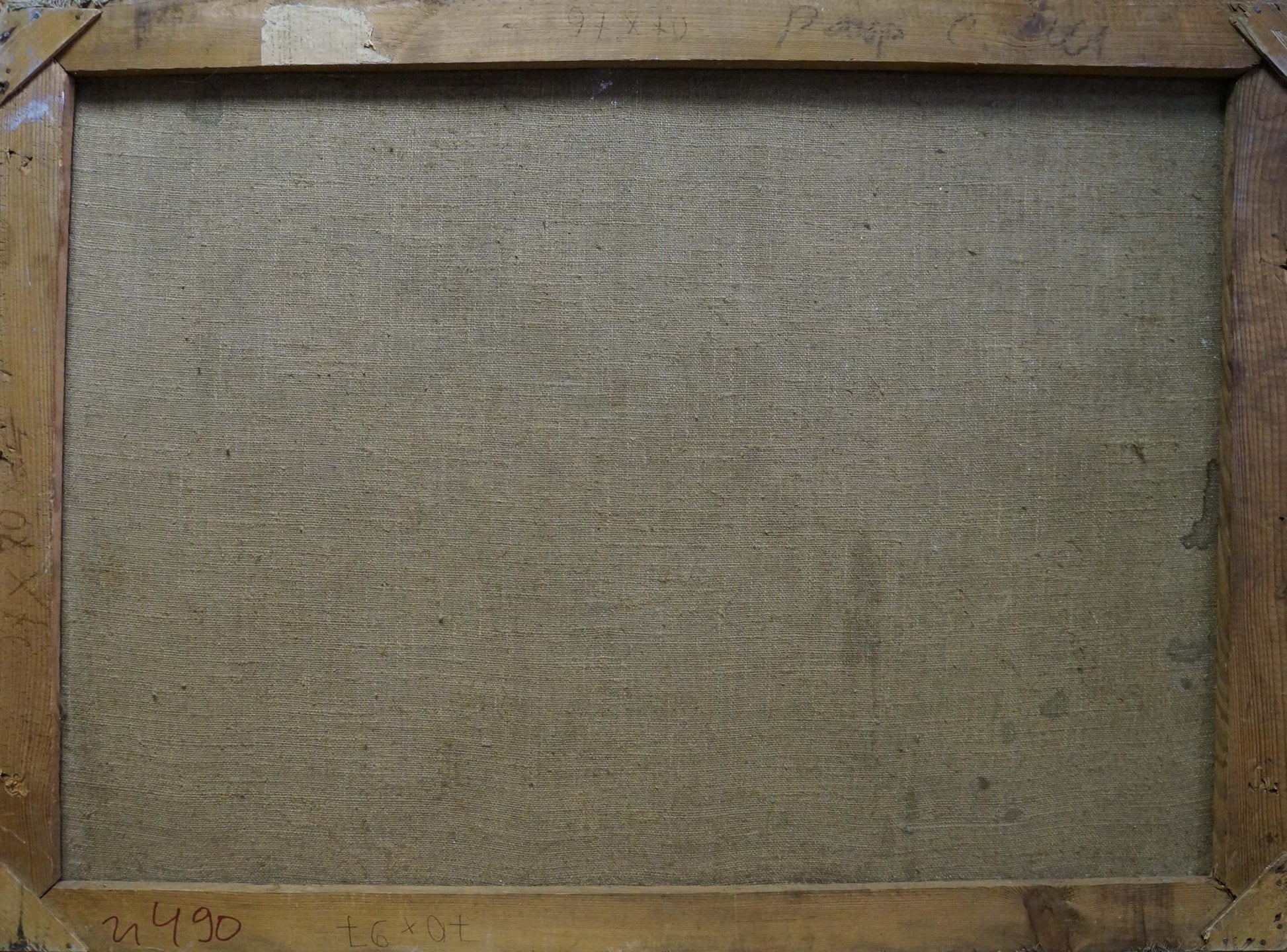 The back of a wooden-framed canvas with a textured, beige linen backing and visible signs of wear.