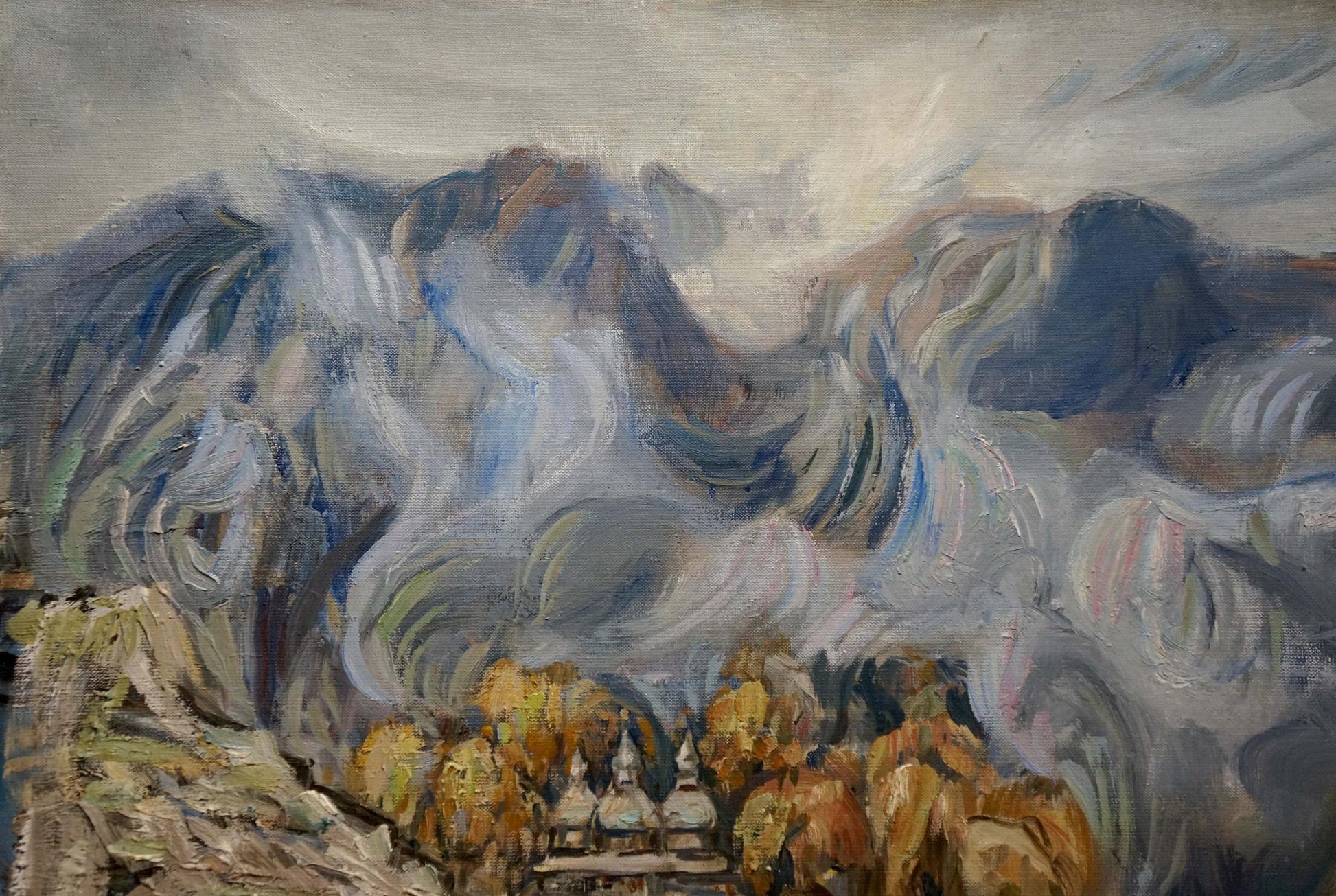 Abstract oil painting of rural landscape with swirling blue mountains and golden trees