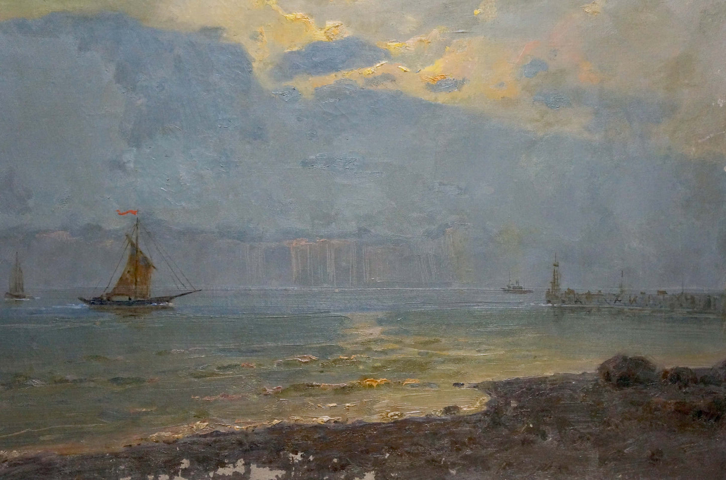 Sailing vessels captured on a still sea in an oil painting, the artist's identity undisclosed