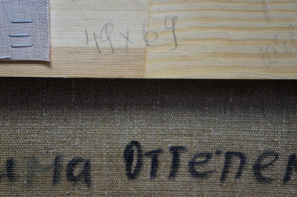Close-up of textured beige canvas with black lettering on Winter Kogan Boris Matveevich oil painting