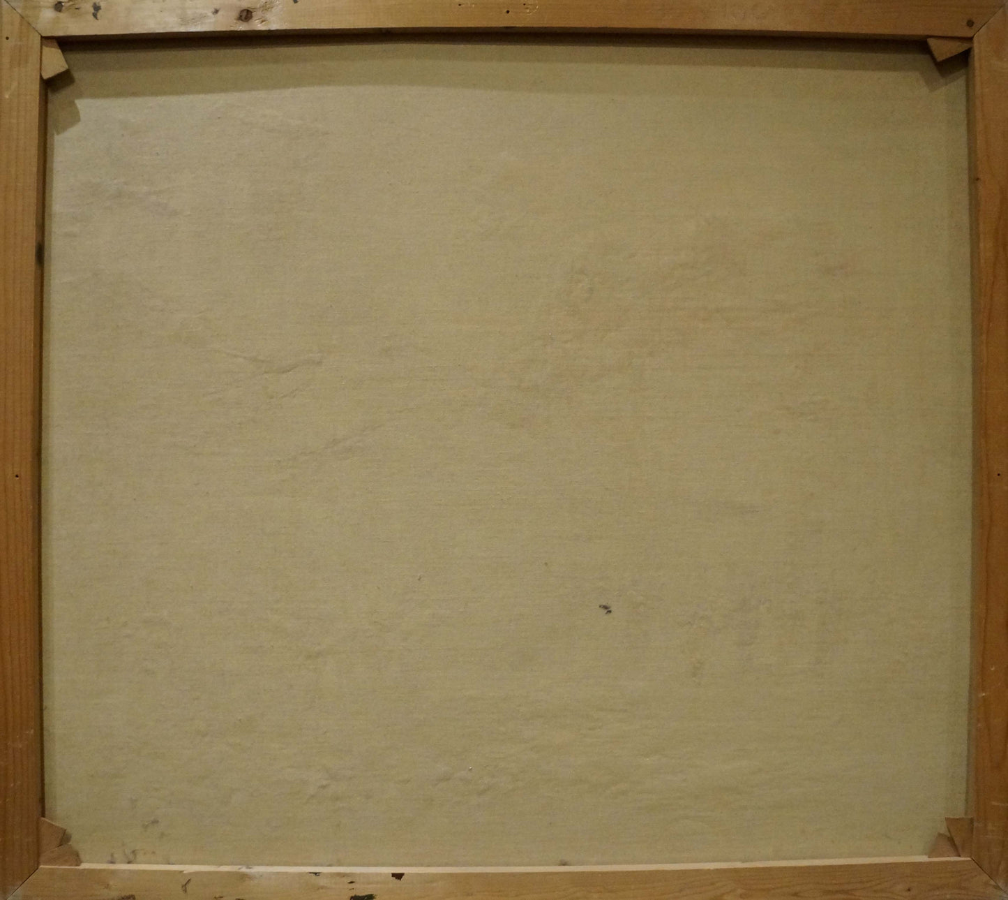 Back of beige canvas oil painting by Evert Collier in light wood frame