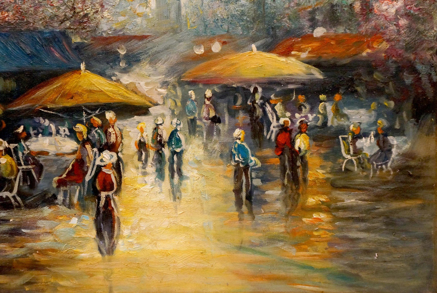 Vibrant impressionist café scene with people resting under yellow umbrellas