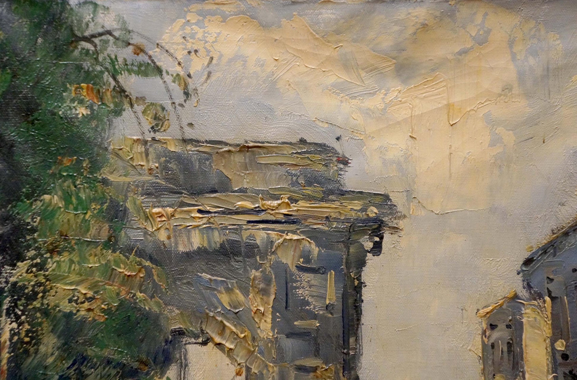 Impasto oil painting by Jan Kelderman of weathered stone city building with green foliage