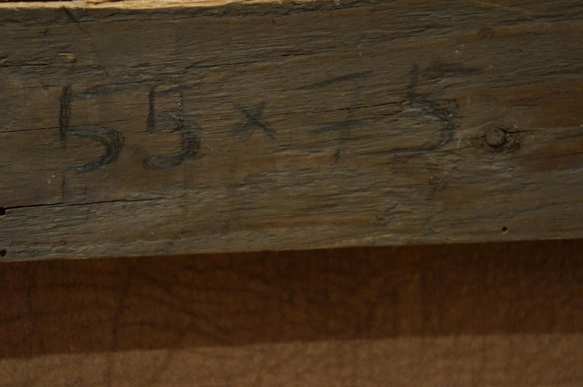 Weathered wooden beam with faded 55x15 markings in Painting City center landscape