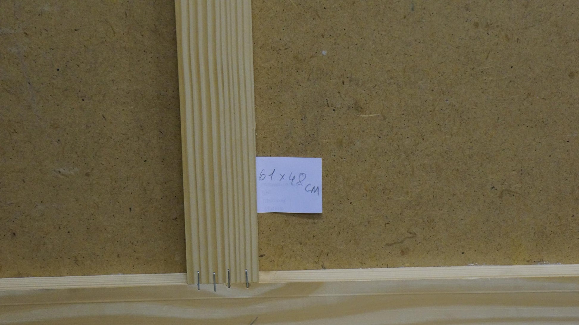 Back of light wood frame with ribbed profile for Plamenitsky oil painting