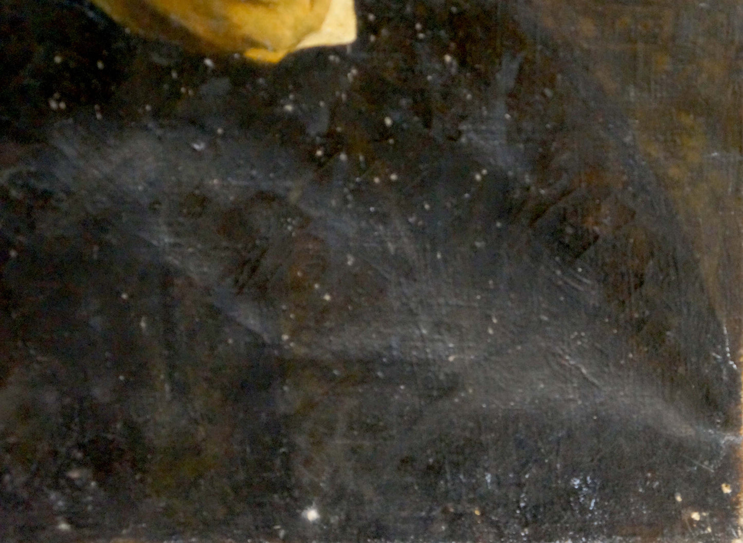 Oil painting portrait of grandmother on dark speckled fabric