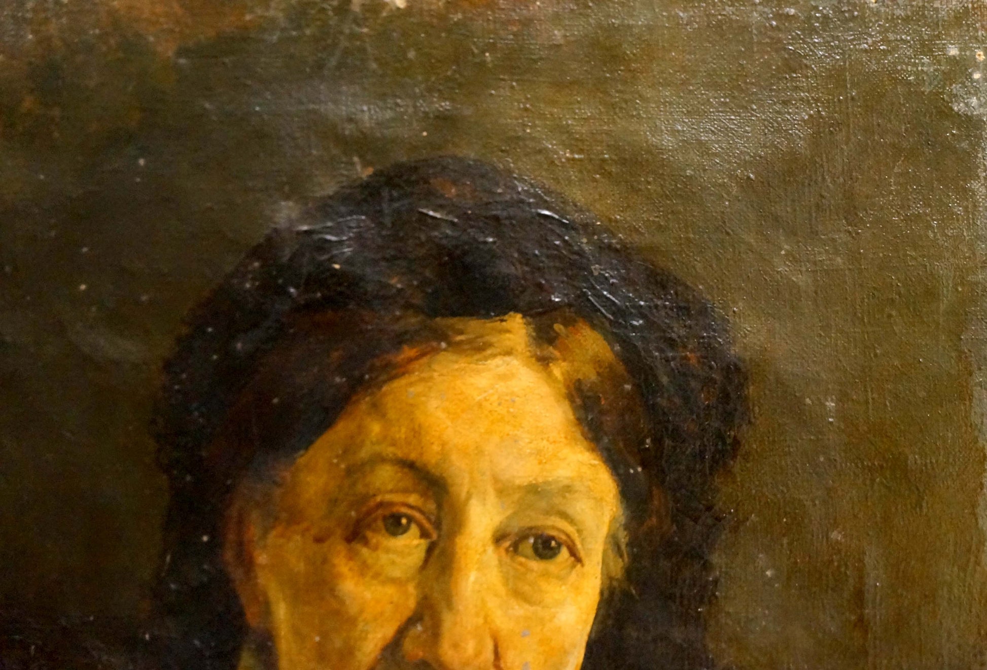 Oil painting portrait of grandmother with warm skin and dark hair