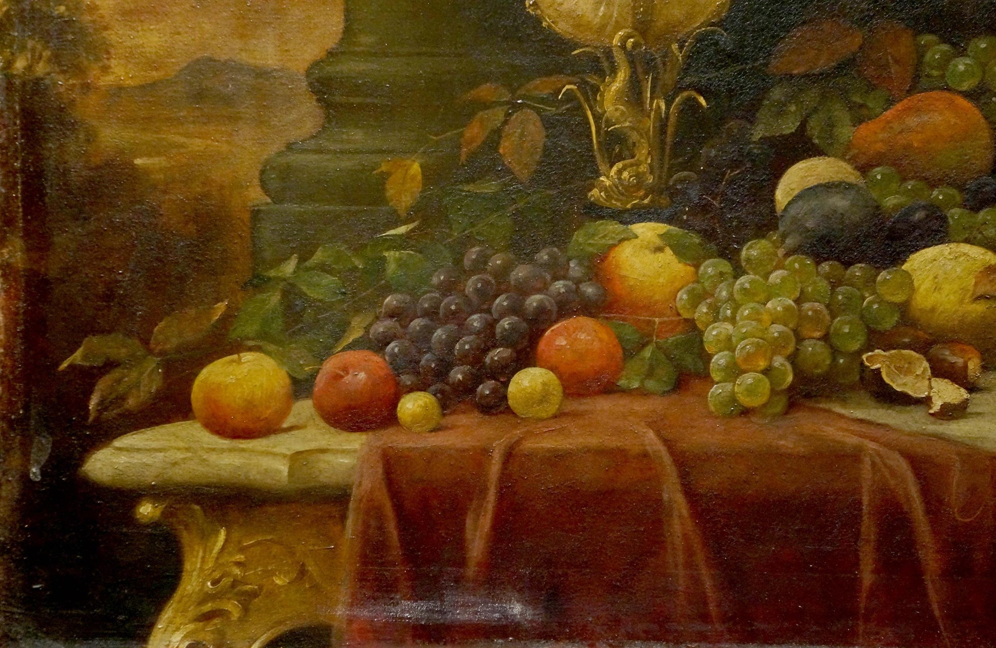 Oil painting of crimson velvet tablecloth with grapes and fruit on gilded table