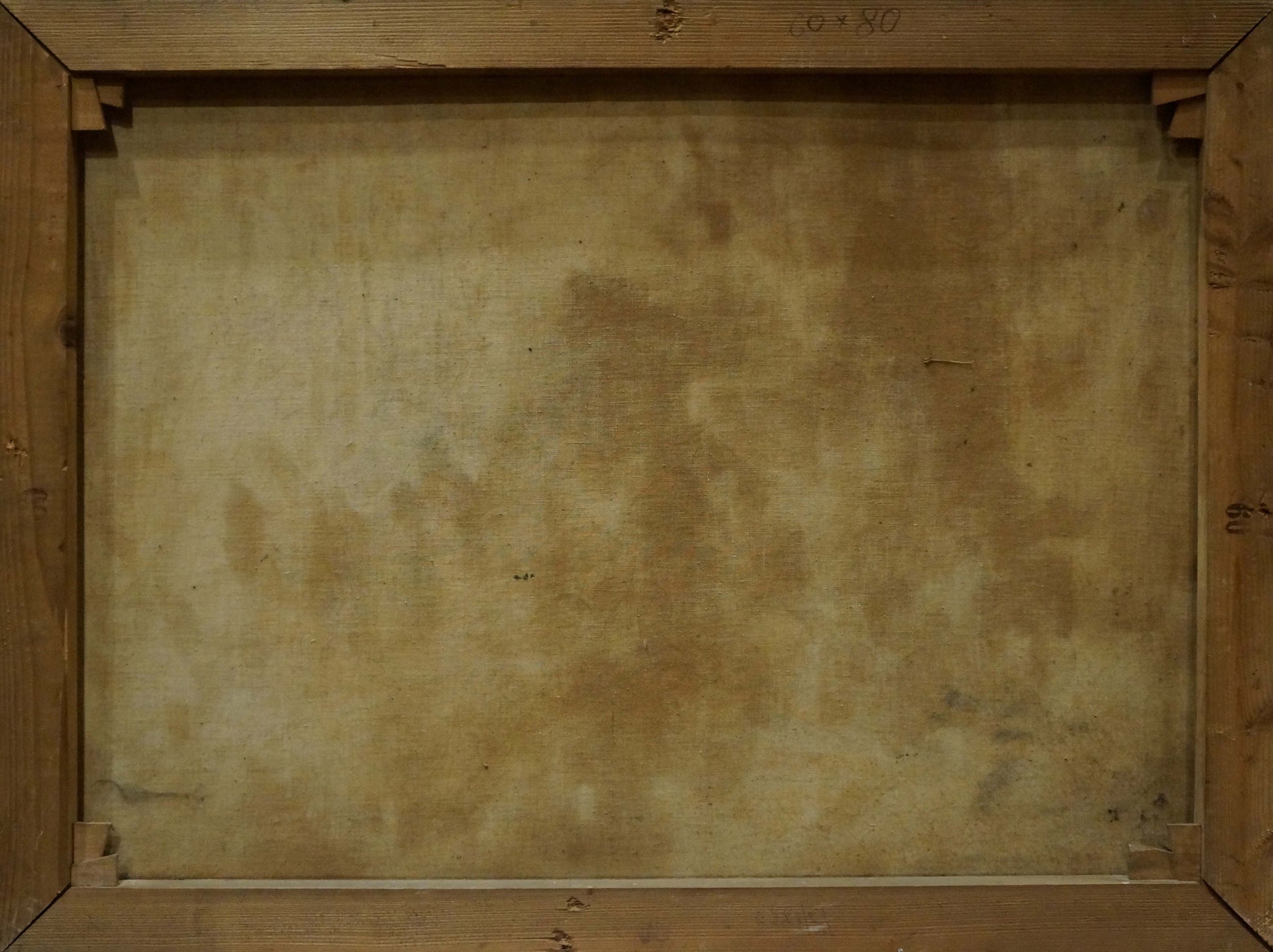 Back of wooden-framed oil painting Food on the table with grapes, aged beige canvas