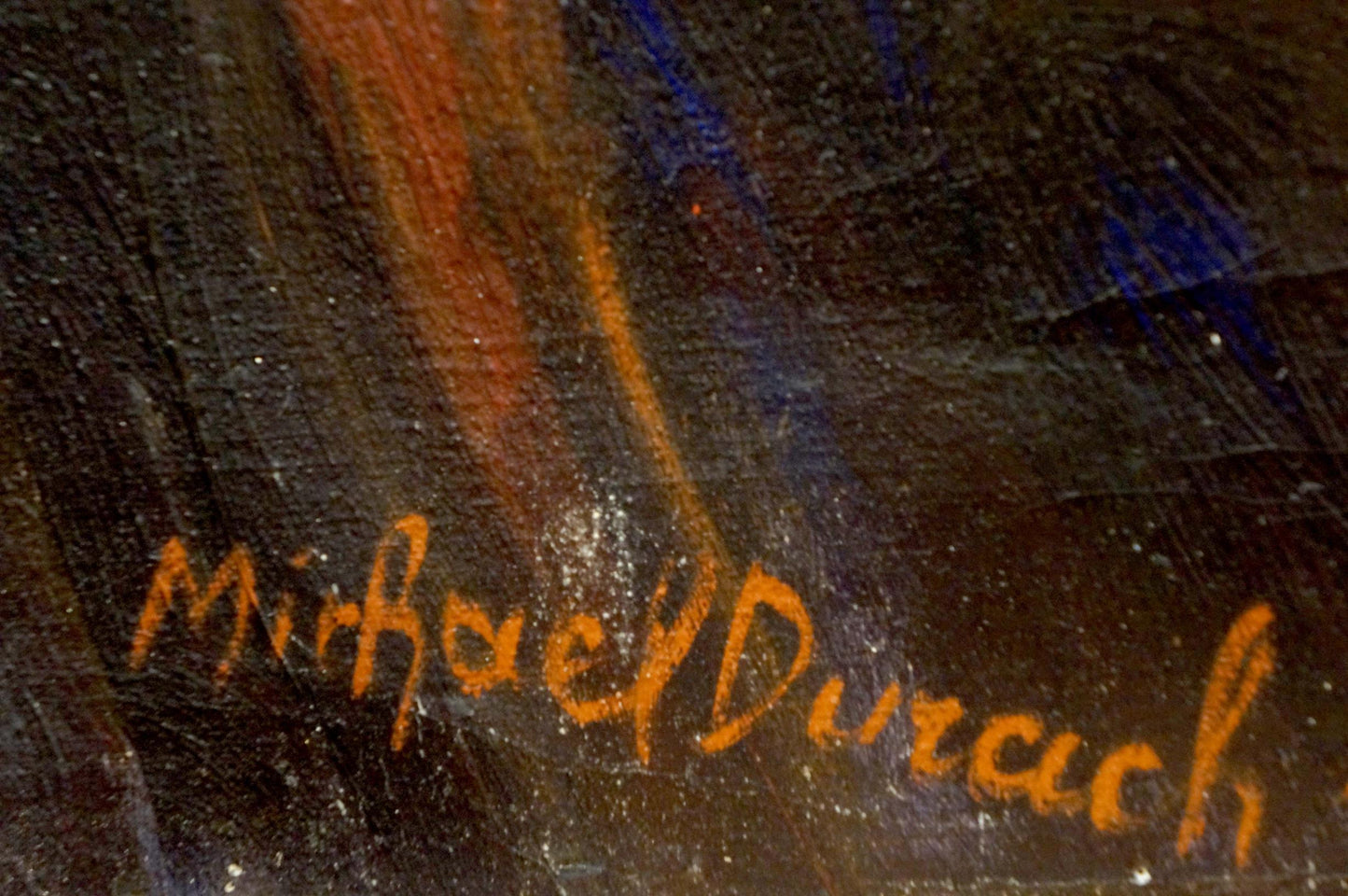 Orange cursive Michael Durach signature on dark textured canvas, oil painting back