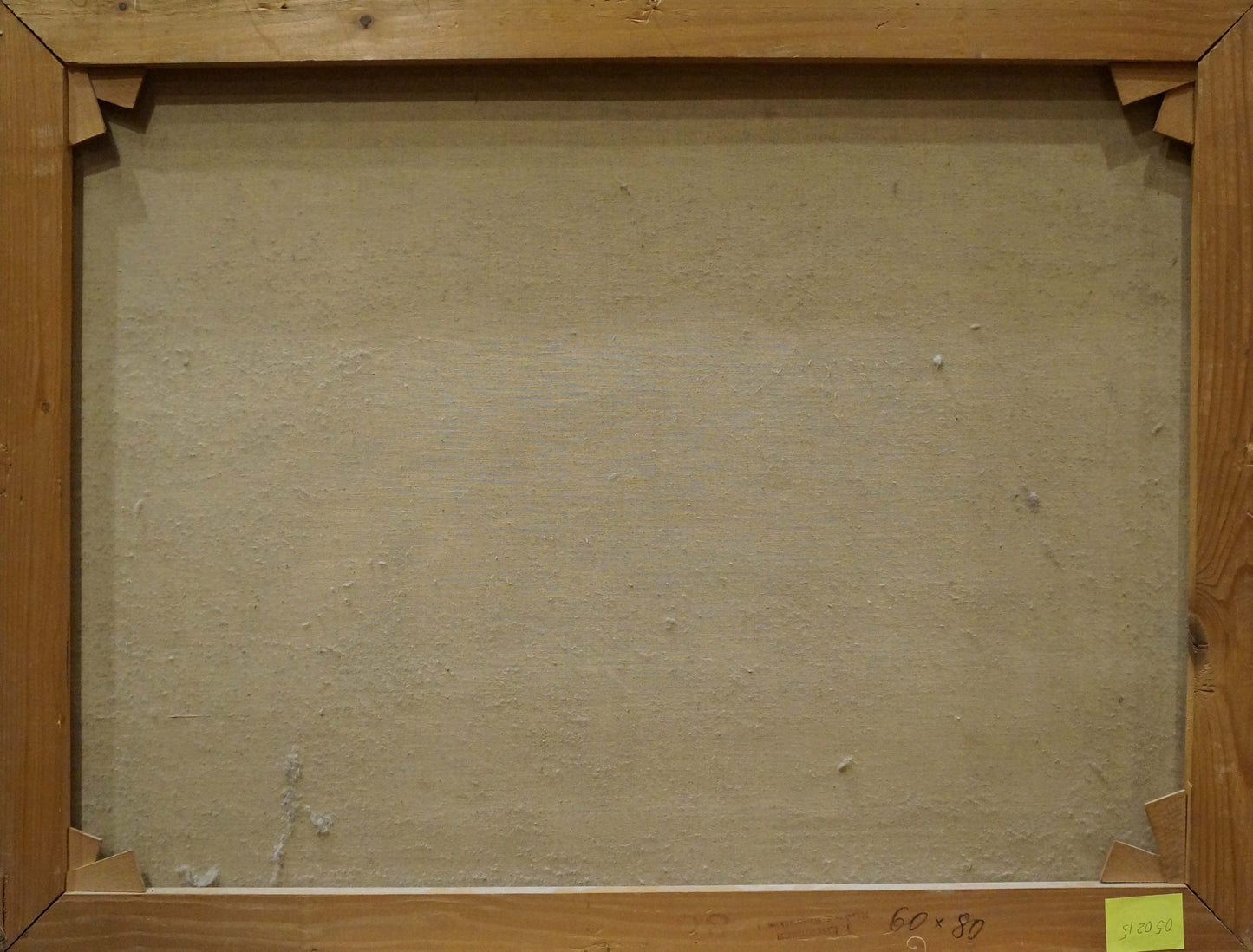 Back of Oil painting The waves beat against the rocks, wooden frame, beige textured canvas