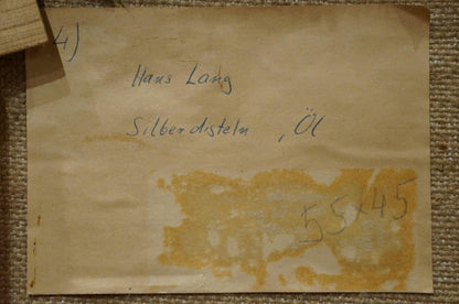 Back of Hans Long Sunflowers oil painting label with handwritten text and stain