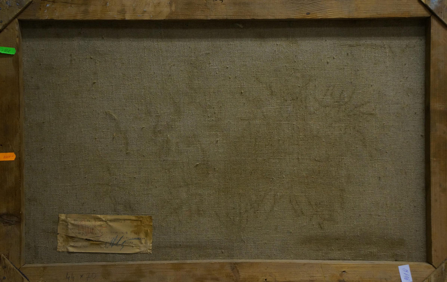 Back of wooden-framed oil painting Winter road in the forest with beige linen and label