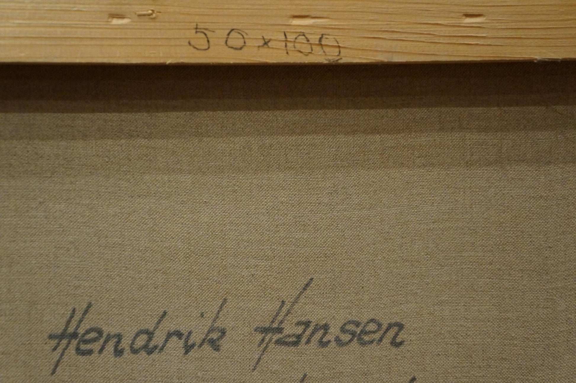 Back of Hendrik Hansen oil painting The Waves: beige canvas with signature and 50x100 stretcher