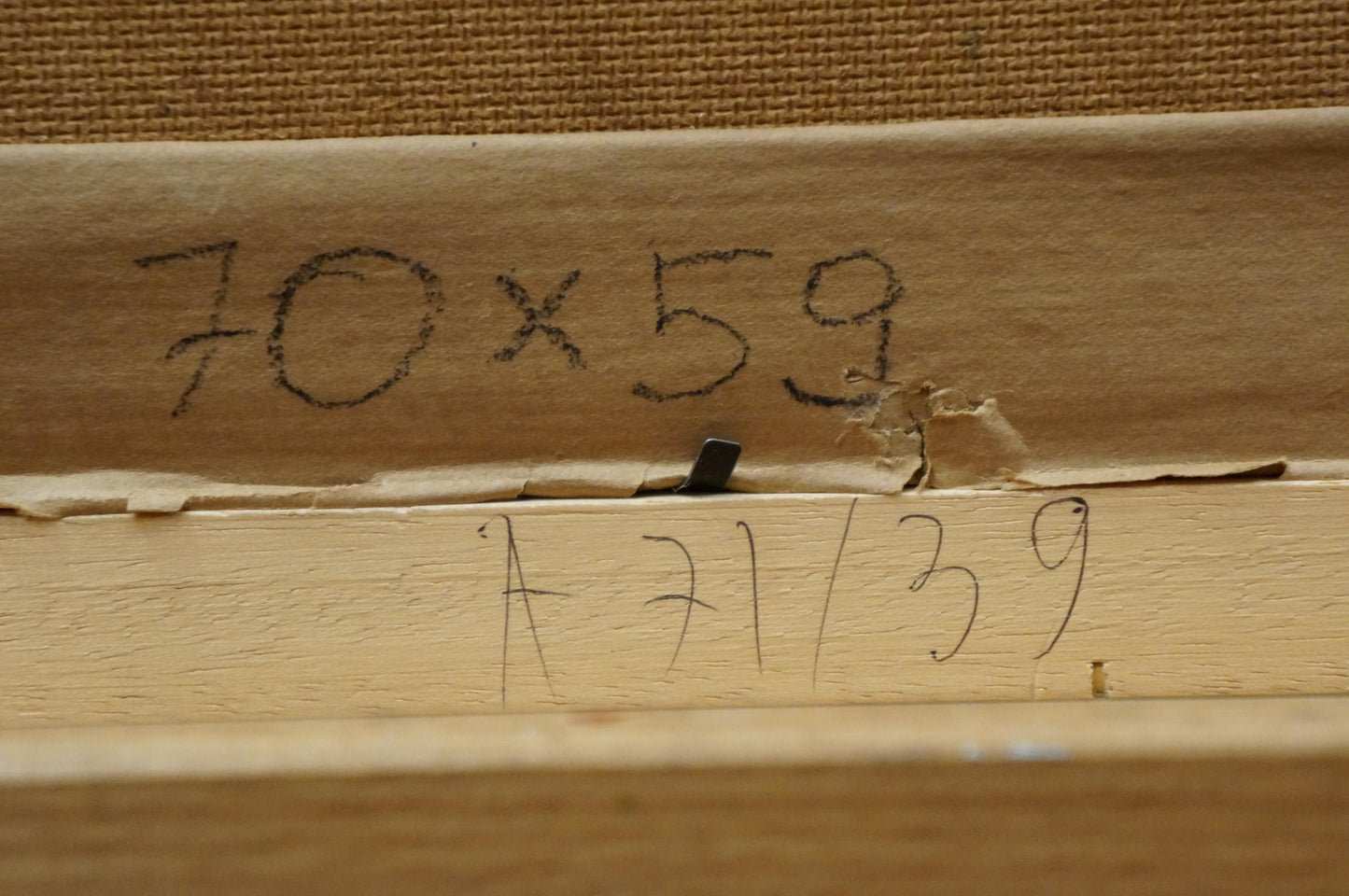 Back of Oil painting Ship canvas with handwritten dimensions and edition number
