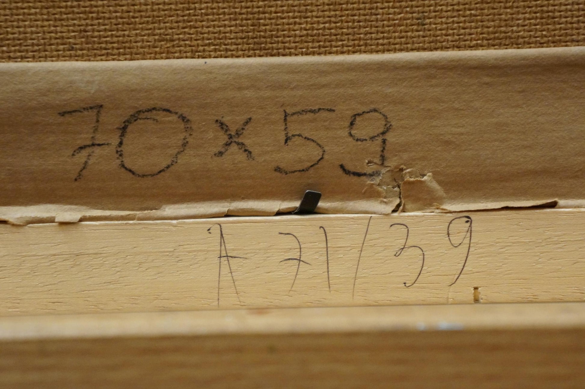 Back of Oil painting Ship canvas with handwritten dimensions and edition number