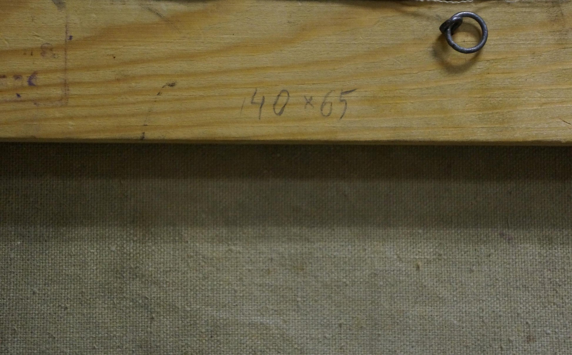 Back of Oil painting Winter fairy tale on rustic wooden stretcher bar with metal ring
