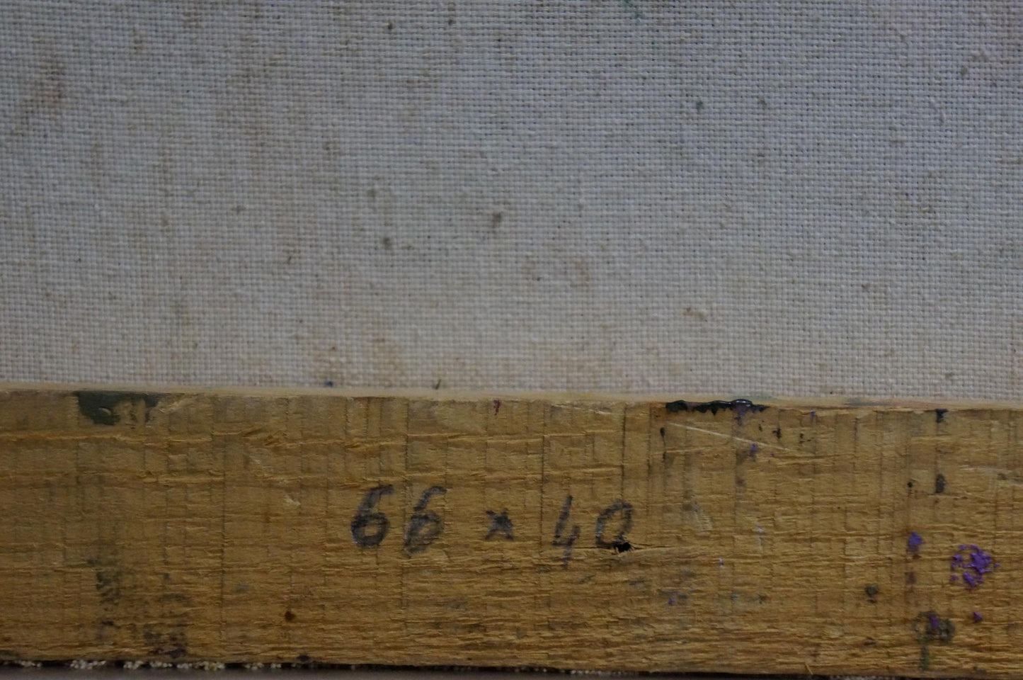 Back of Oil painting Lilac joy on the table: weathered stretcher bar with faded 66 x 42 inch markings