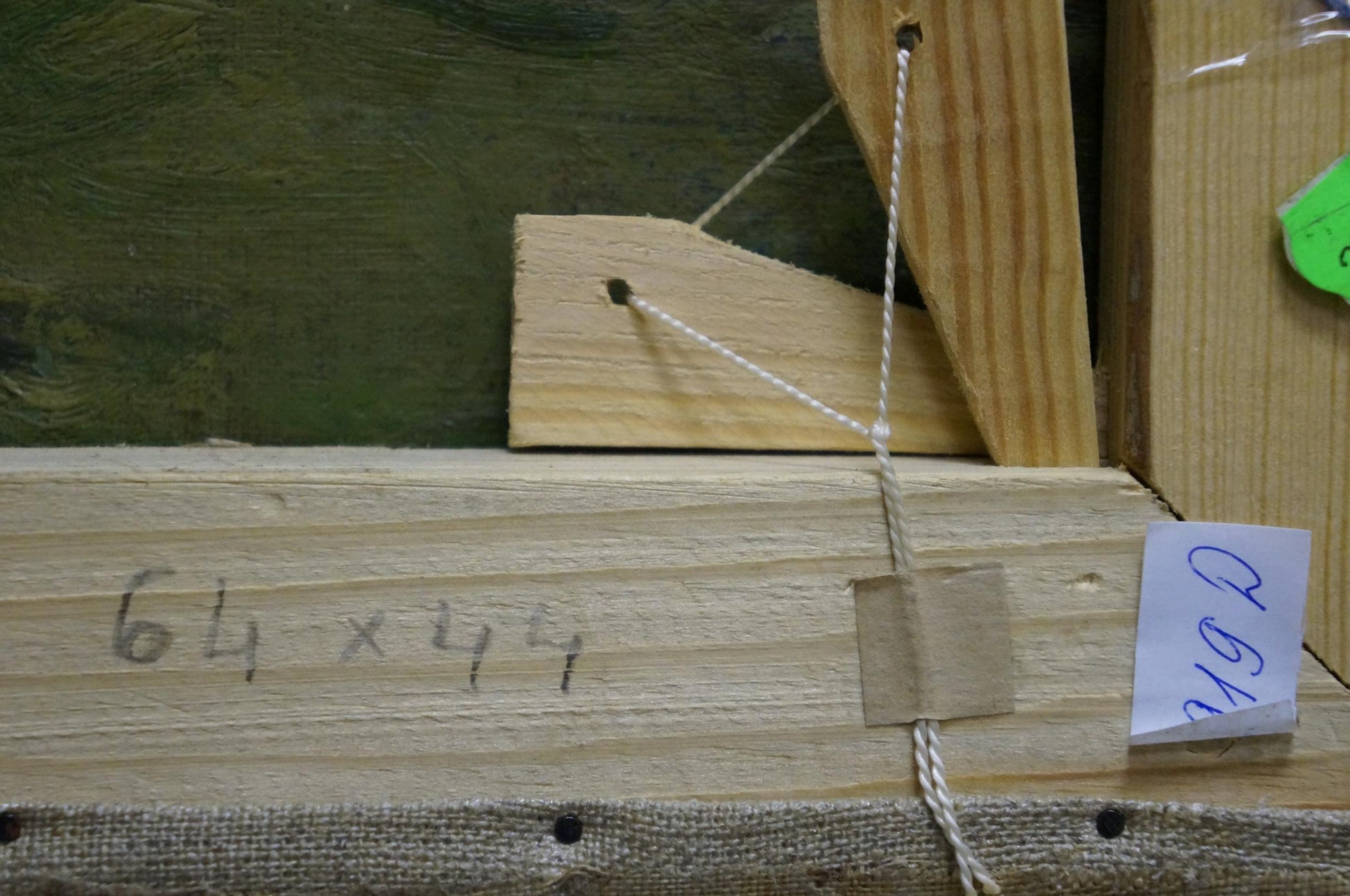 Back of Oil painting On the road: light wooden stretcher bar with dimensions label