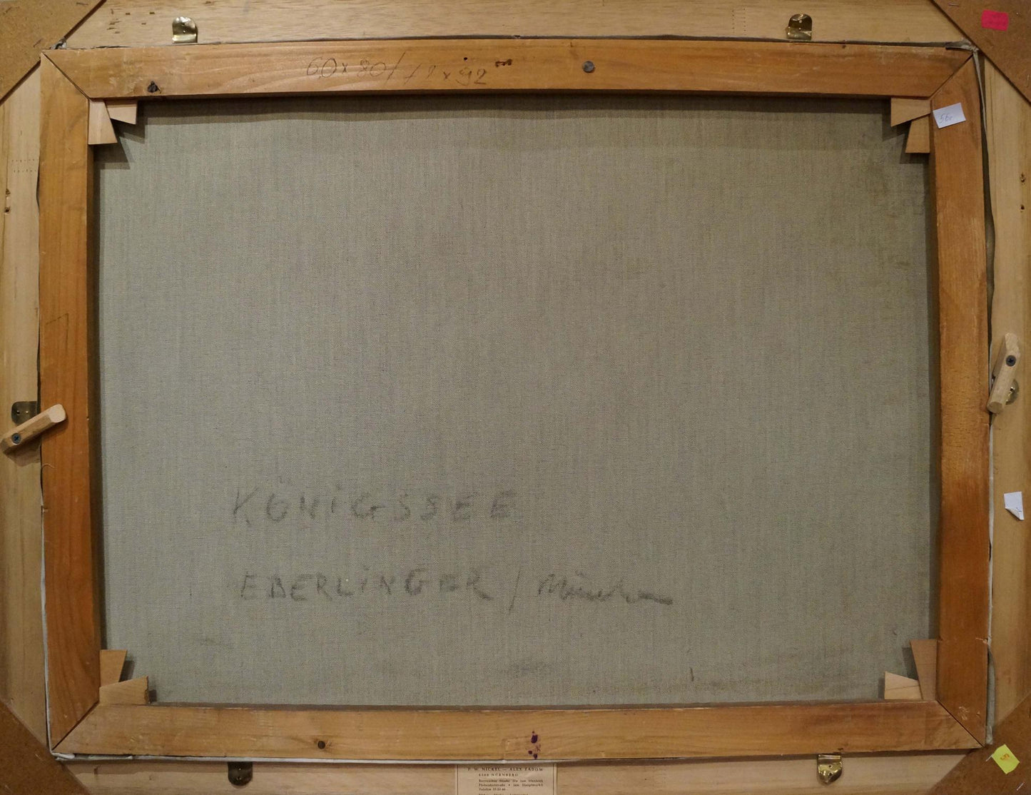 Back of Oil painting Landscape Eber Lincer canvas with handwritten text on gray fabric