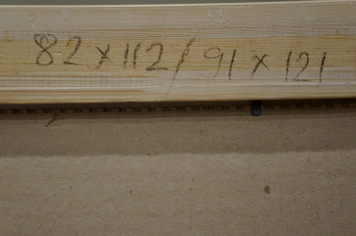 Back of light wooden frame with handwritten measurements for Reemtsma figure portrait