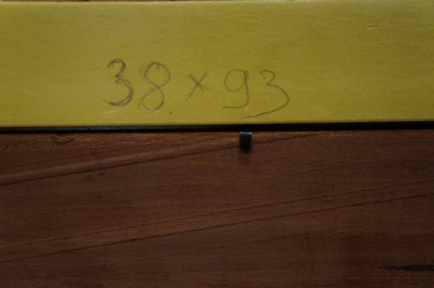 Back of Abstract painting People at the bar: yellow board with 38 x 93 dimensions