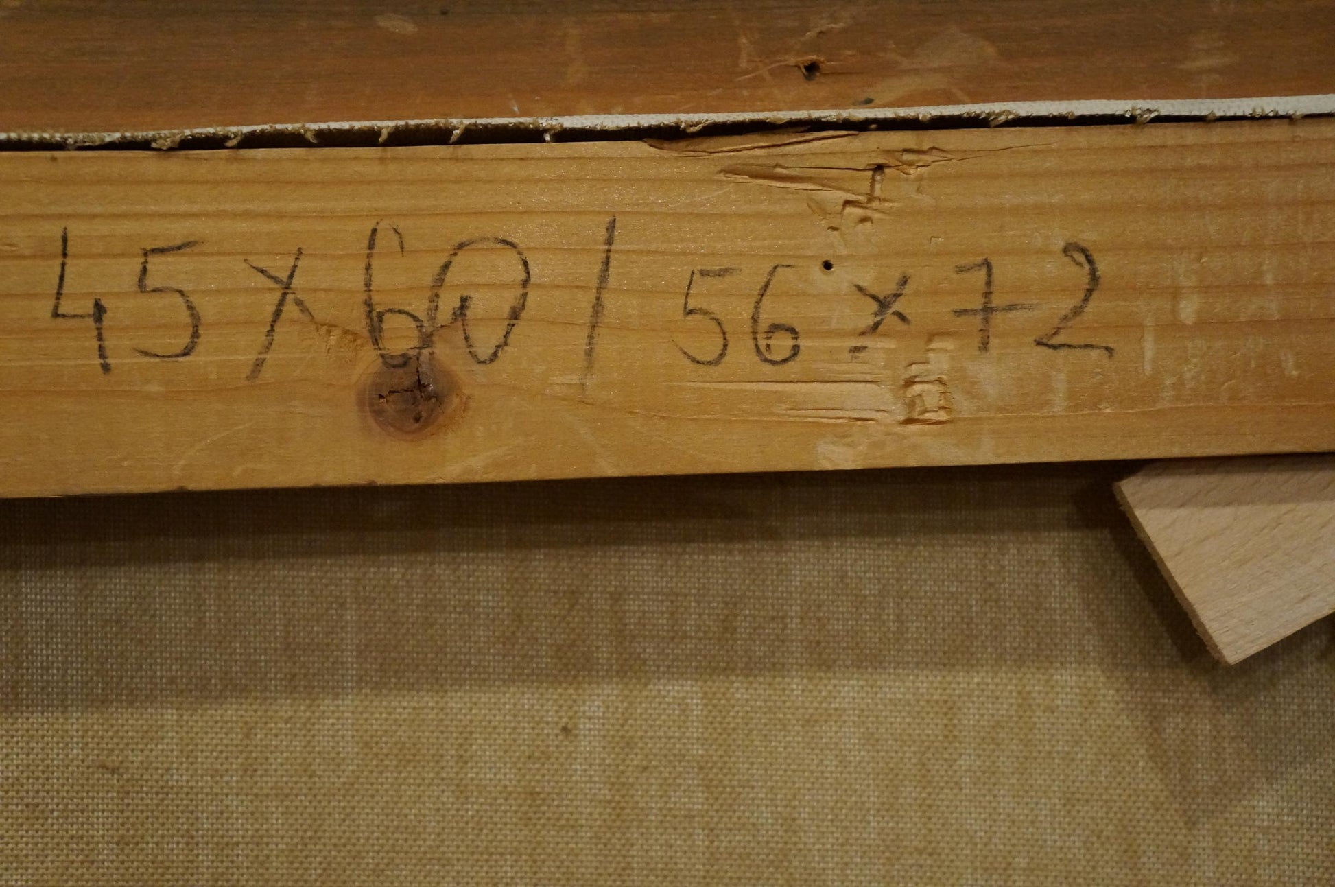 Back of Abstract oil painting Thoughts of people on light brown wooden stretcher bar with black marker measurements
