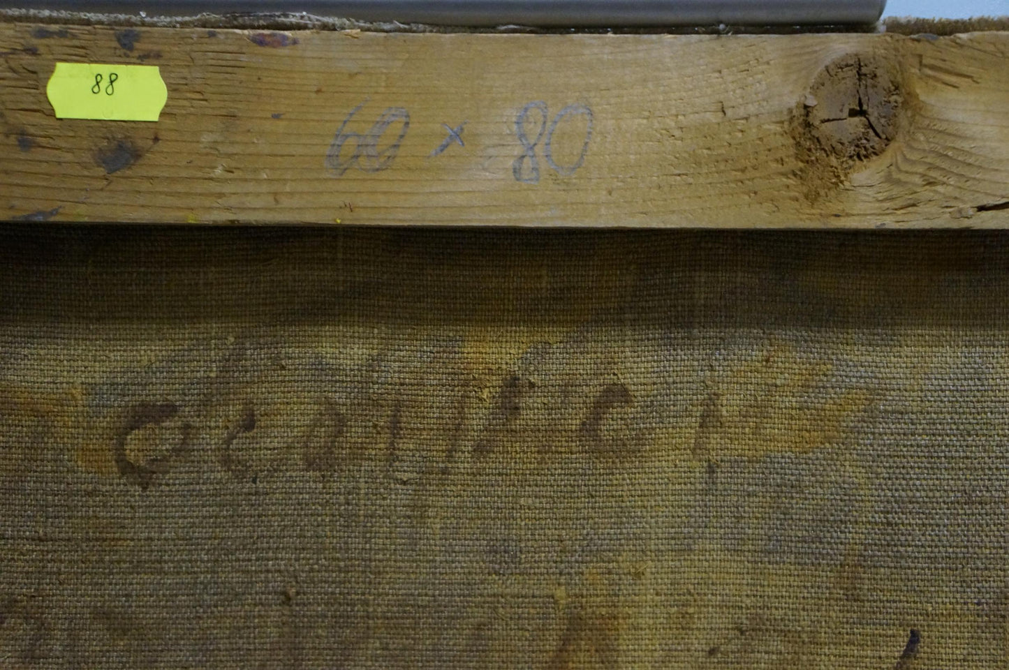 Back of Oil painting Raging sea by Puzyrkov: weathered stretcher bar with 88 label