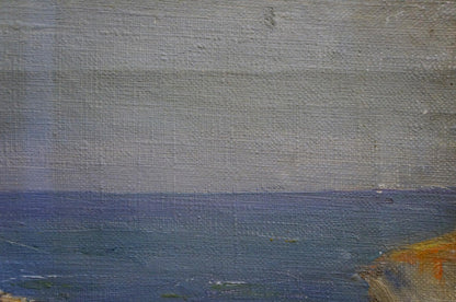 Oil painting Stones by the sea: serene seascape with gray skies, blue water, orange tones