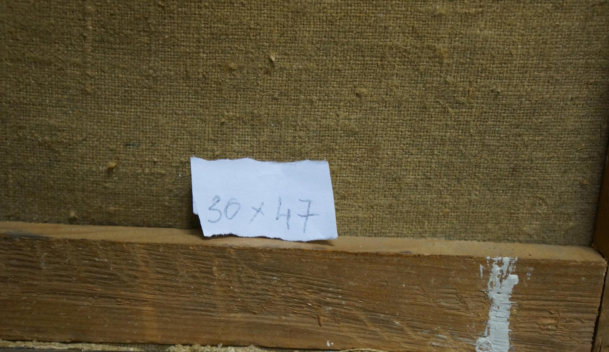 Back of Oil painting Stones by the sea: handwritten 30 x 47 inch note on torn paper