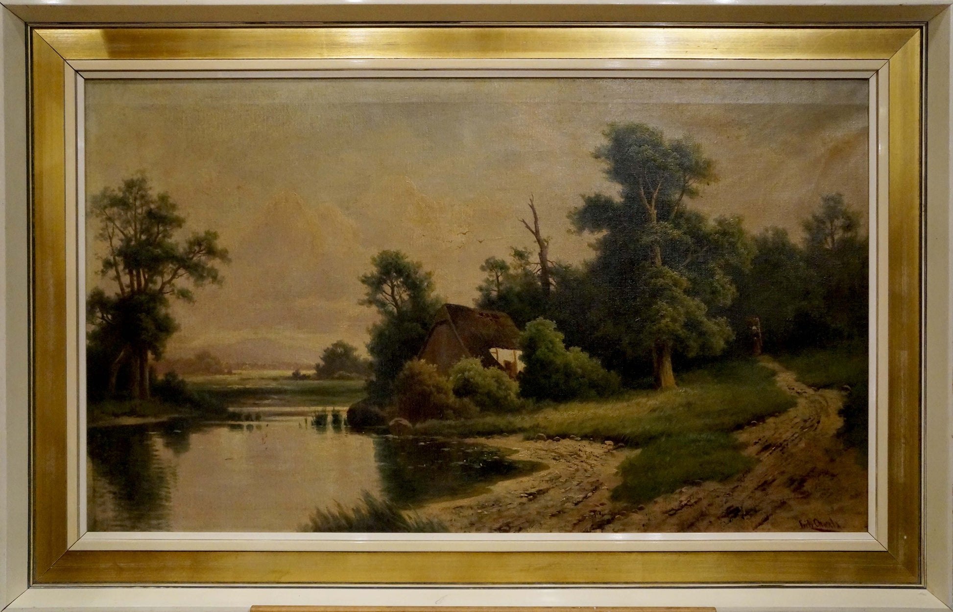 Oil painting Lake at the house: rustic cottage by river in gold frame