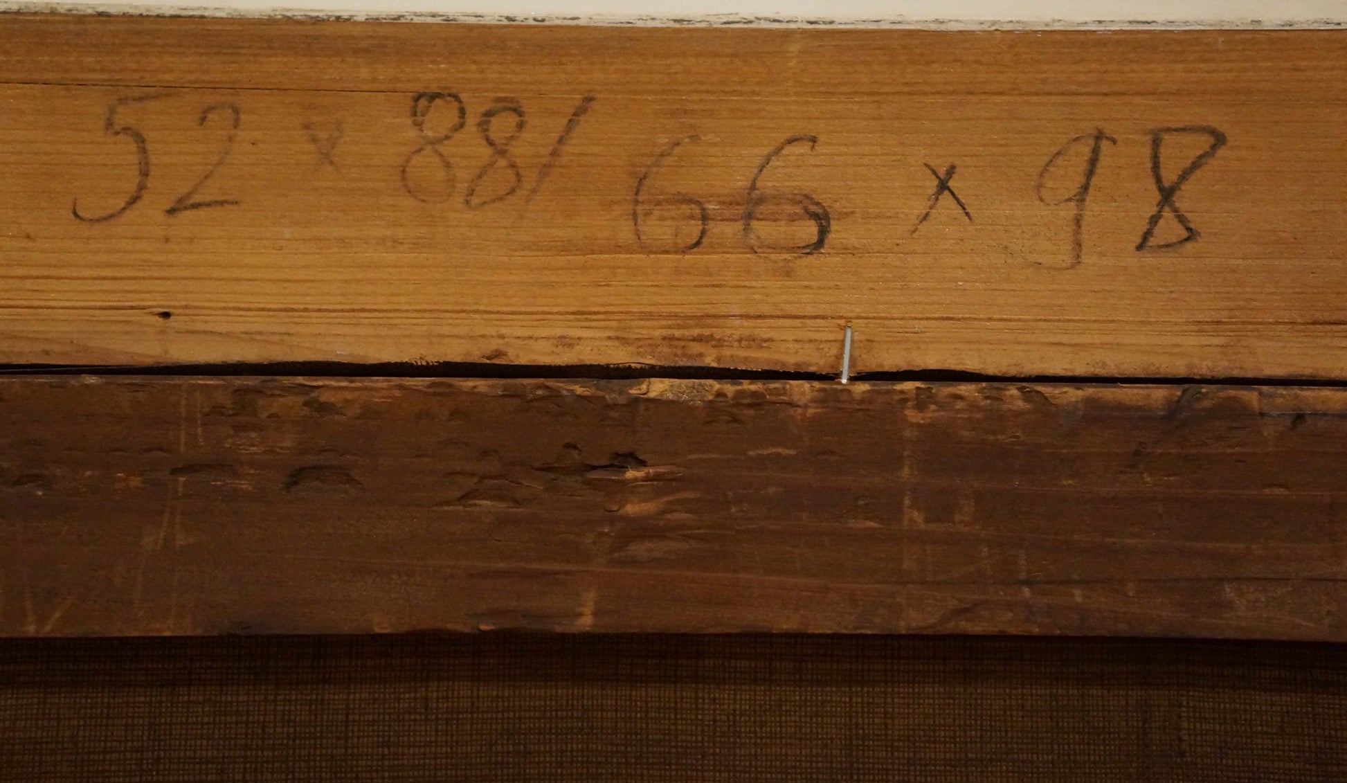 Back of Oil painting Lake at the house: weathered wooden beam with handwritten measurements in black ink