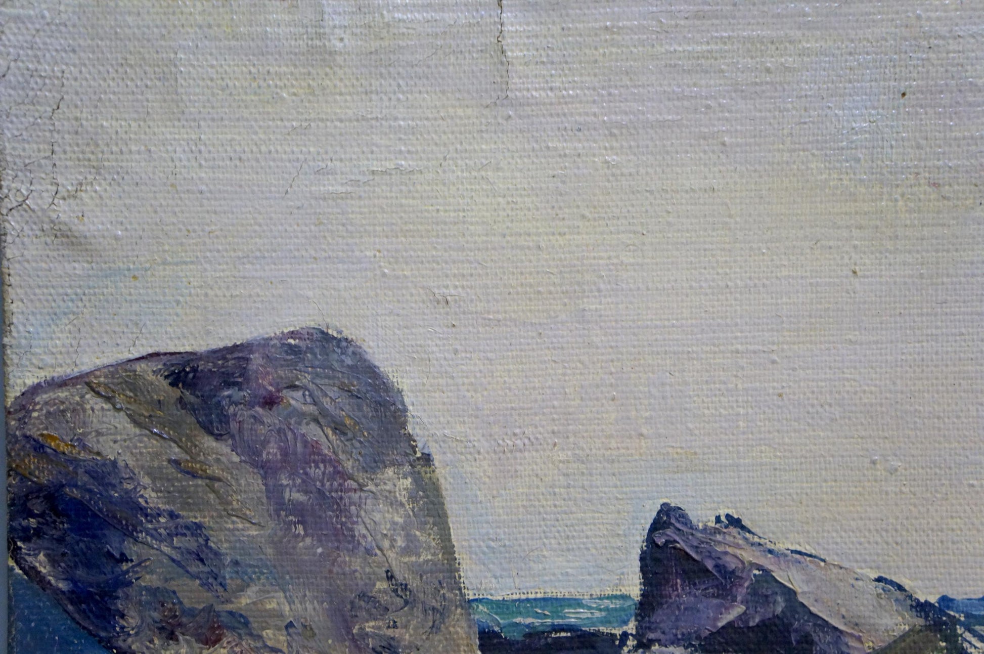Oil painting Craggy Seashore by Stepan Yarovoy: gray purple rocks on pale sky